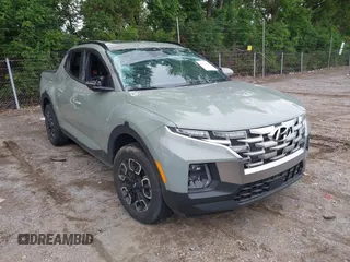 2023 Hyundai Santa Cruz SEL Premium z VIN 5NTJDDAF9PH068394, wystawiony jako IAAI lot #42329558 z przebiegiem 6 774 mil mil oraz . Historia ofert i sprzedaży dostępna na DreamBid. Obrazek 1.