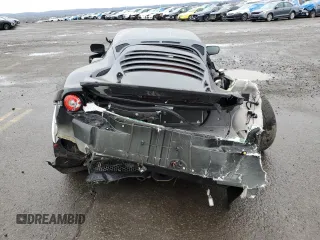 2021 Lotus Evora GT z VIN SCCLMDDN5MHA10403, wystawiony jako Copart lot #52484955 z przebiegiem Nie podano mil oraz Szkody całkowita. Historia ofert i sprzedaży dostępna na DreamBid. Obrazek 6.