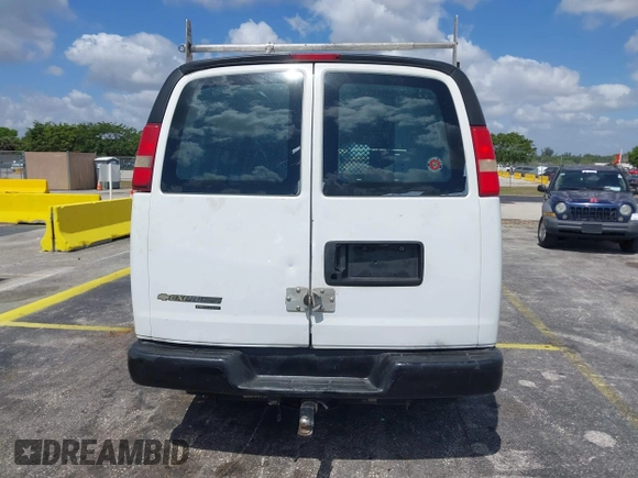 2014 Chevrolet Express Cargo Van with VIN 1GCWGFFA2E1103446, listed as a IAAI auction lot 42177760 with 91,232 mi miles. Bid and sale history available at carsss.com. Image 16.