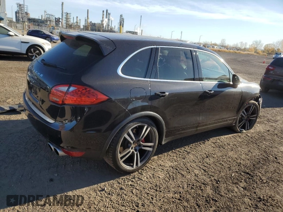 2012 Porsche Cayenne Turbo with VIN WP1AC2A26CLA82602, listed as a Copart auction lot 77752814 with 115,965 mi miles and Salvage title. Bid and sale history available at DreamBid. Image 3.