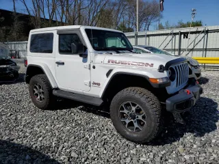 2023 Jeep Wrangler Rubicon with VIN 1C4HJXCG9PW505608, listed as a Copart auction lot 54429105 with 5,461 mi miles and Salvage title. Bid and sale history available at DreamBid. Image 4.