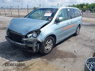 2006 Honda Odyssey EX-L with VIN 5FNRL38716B103035, listed as a IAAI auction lot 42092668 with 264,431 mi miles and . Bid and sale history available at DreamBid. Image 2.