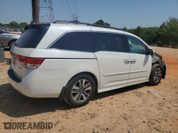 2016 Honda Odyssey Touring Elite with VIN 5FNRL5H94GB109829, listed as a Copart auction lot 52583225 with 70,740 mi miles and Salvage Title. Bid and sale history available at carsss.com. Image 3.