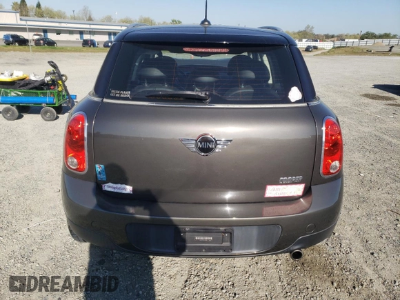 2012 MINI Countryman with VIN WMWZB3C58CWM03815, listed as a Copart auction lot 50097405 with 84,137 mi miles and Salvage Title. Bid and sale history available at DreamBid. Image 6.
