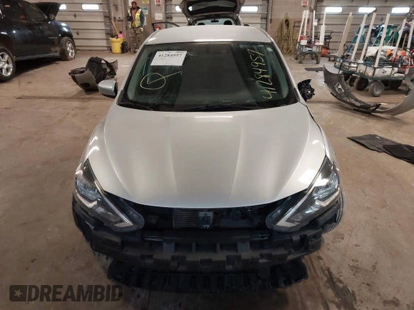 2019 Nissan Sentra S z VIN 3N1AB7AP7KY345072, wystawiony jako IAAI lot #41284957 z przebiegiem 104 084 mil mil oraz . Historia ofert i sprzedaży dostępna na DreamBid. Obrazek 13.
