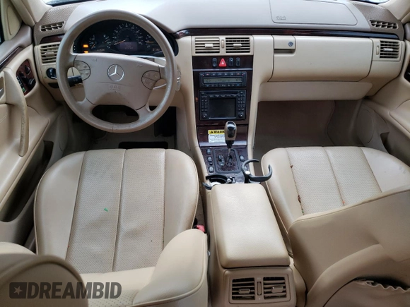 2001 Mercedes-Benz E-Class with VIN WDBJH65J41B312277, listed as a Copart auction lot 70261594 with 123,702 mi miles and Clean Title. Bid and sale history available at carsss.com. Image 8.