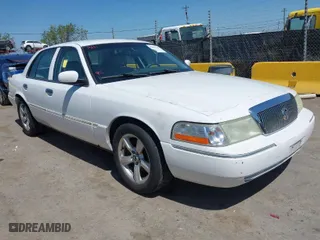 2005 Mercury Grand Marquis LS Premium with VIN 2MEFM75W15X631500, listed as a IAAI auction lot 42042103 with 164,810 mi miles. Bid and sale history available at carsss.com. Image 1.