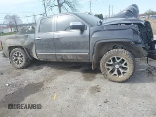 2015 GMC Sierra 1500 SLE z VIN 1GTV2UEC3FZ212843, wystawiony jako IAAI lot #42030130 z przebiegiem Nie podano mil oraz . Historia ofert i sprzedaży dostępna na DreamBid. Obrazek 13.