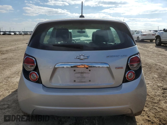 2016 Chevrolet Sonic LTZ z VIN 1G1JE6SB8G4159979, wystawiony jako Copart lot #83398084 z przebiegiem 120 767 mil mil oraz Szkoda całkowita • Salvage title. Historia ofert i sprzedaży dostępna na DreamBid. Obrazek 6.