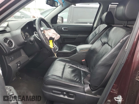 2011 Honda Pilot Touring z VIN 5FNYF3H92BB039165, wystawiony jako Copart lot #59596105 z przebiegiem 182 944 mil mil oraz Szkoda całkowita • Salvage title. Historia ofert i sprzedaży dostępna na DreamBid. Obrazek 7.