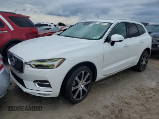 2020 Volvo XC60 Inscription z VIN YV4102DL9L1520715, wystawiony jako Copart lot #76833114 z przebiegiem 21 971 mil mil oraz Szkoda całkowita • Salvage title. Historia ofert i sprzedaży dostępna na DreamBid. Obrazek 1.