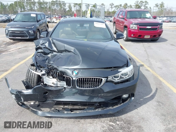 2014 BMW 4 Series 428i with VIN WBA3V5C59EP747773, listed as a IAAI auction lot 41617565 with 65,288 mi miles and . Bid and sale history available at DreamBid. Image 12.
