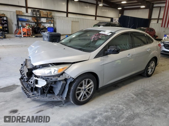 2018 Ford Focus SE z VIN 1FADP3FE9JL234158, wystawiony jako Copart lot #51788755 z przebiegiem 99 877 mil mil oraz Szkoda całkowita • Salvage title. Historia ofert i sprzedaży dostępna na DreamBid. Obrazek 1.