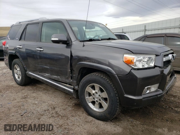 2011 Toyota 4Runner Trail with VIN JTEBU5JR3B5045233, listed as a Copart auction lot 49321485 with 167,615 mi miles and Salvage title. Bid and sale history available at DreamBid. Image 4.
