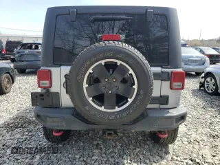 2015 Jeep Wrangler Unlimited Rubicon Hard Rock with VIN 1C4HJWFG4FL575054, listed as a Copart auction lot 51672655 with 130,405 mi miles and Clean title. Bid and sale history available at DreamBid. Image 6.