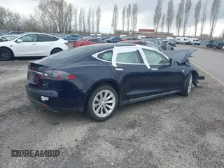 2015 Tesla Model S 85D with VIN 5YJSA1H23FFP79020, listed as a IAAI auction lot 41819392 with Not Provided miles. Bid and sale history available at carsss.com. Image 4.