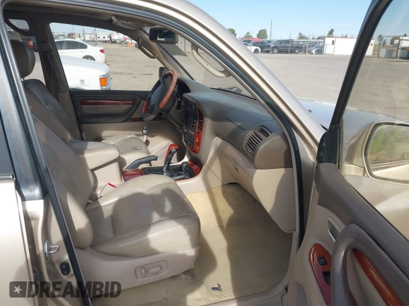 2000 Lexus LX 470 with VIN JT6HT00W0Y0098917, listed as a IAAI auction lot 41937661 with 180,980 mi miles and . Bid and sale history available at DreamBid. Image 5.