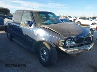 2002 Ford F-150 XLT with VIN 1FTRW07652KB35739, listed as a IAAI auction lot 41349012 with 180,863 mi miles. Bid and sale history available at carsss.com. Image 1.