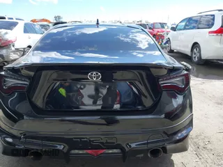 2019 Toyota 86 GT with VIN JF1ZNAE10K9702100, listed as a IAAI auction lot 41786513 with 56,687 mi miles. Bid and sale history available at carsss.com. Image 16.