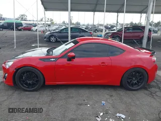 2016 Scion FR-S with VIN JF1ZNAA11G9709120, listed as a IAAI auction lot 41361502 with 74,281 mi miles. Bid and sale history available at carsss.com. Image 15.