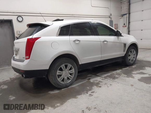 2015 Cadillac SRX Luxury Collection with VIN 3GYFNBE38FS596318, listed as a IAAI auction lot 42119660 with 45,178 mi miles. Bid and sale history available at carsss.com. Image 4.