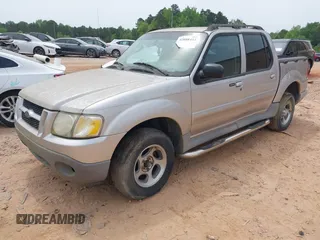 2003 Ford Explorer Sport Trac XLS z VIN 1FMZU67E53UC26334, wystawiony jako IAAI lot #42088444 z przebiegiem 175 922 mil mil oraz . Historia ofert i sprzedaży dostępna na DreamBid. Obrazek 2.