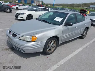 2002 Pontiac Grand Am SE1 with VIN 1G2NF52F82C315525, listed as a IAAI auction lot 42013927 with 344,107 mi miles. Bid and sale history available at carsss.com. Image 2.