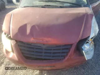 2007 Chrysler Town & Country Touring z VIN 2A8GP54L37R127233, wystawiony jako Copart lot #72338074 z przebiegiem Nie podano mil oraz Szkoda całkowita • Salvage title. Historia ofert i sprzedaży dostępna na DreamBid. Obrazek 12.