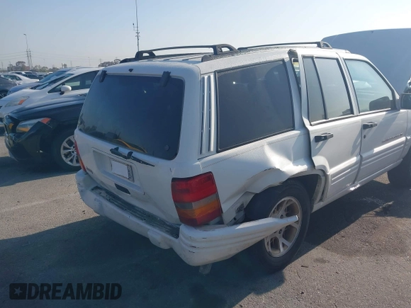 1998 Jeep Grand Cherokee with VIN 1J4FX78S2WC281501, listed as a IAAI auction lot 42140170 with 177,575 mi miles and . Bid and sale history available at DreamBid. Image 6.