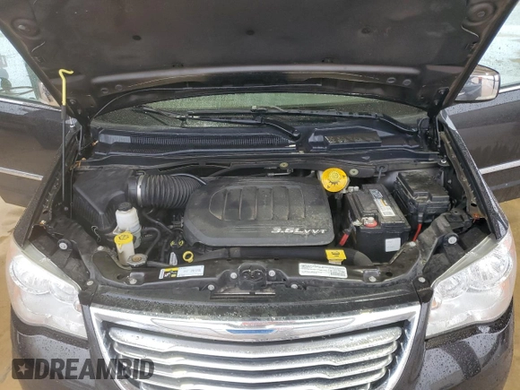 2015 Chrysler Town & Country Touring L z VIN 2C4RC1CG5FR628504, wystawiony jako Copart lot #54216315 z przebiegiem 129 479 mil mil oraz Szkoda całkowita • Salvage title. Historia ofert i sprzedaży dostępna na DreamBid. Obrazek 12.