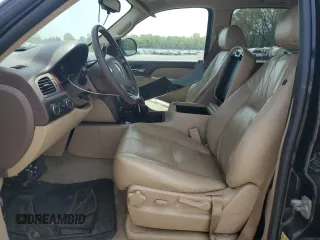 2012 Chevrolet Suburban LT with VIN 1GNSKJE77CR298049, listed as a Copart auction lot 61171865 with 247,737 mi miles and Salvage title. Bid and sale history available at DreamBid. Image 7.
