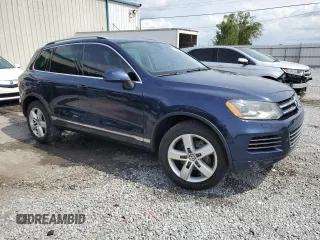 2013 Volkswagen Touareg Lux с VIN WVGEF9BP0DD002456, выставлен на аукционе Copart как лот 56034435 с пробегом 131 412 миль миль и Списание • Salvage title. История ставок и продаж доступна на DreamBid. Изображение 4.