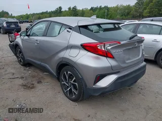 2018 Toyota C-HR XLE with VIN NMTKHMBX7JR014817, listed as a IAAI auction lot 42254183 with 128,561 mi miles and . Bid and sale history available at DreamBid. Image 3.