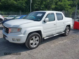 2010 Honda Ridgeline RTL with VIN 5FPYK1F58AB012526, listed as a IAAI auction lot 42421618 with 258,727 mi miles and . Bid and sale history available at DreamBid. Image 2.