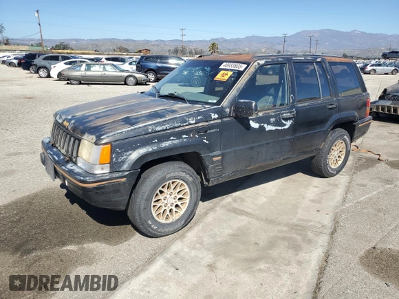 1993 Jeep Grand Cherokee Limited with VIN 1J4GZ78S3PC502345, listed as a Copart auction lot 46933805 with 121,652 mi miles and Salvage title. Bid and sale history available at DreamBid. Image 1.