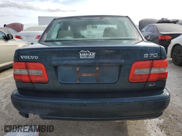 1998 Volvo S70 z VIN YV1LS5675W3511553, wystawiony jako Copart lot #75102454 z przebiegiem Nie podano mil oraz Szkody całkowita. Historia ofert i sprzedaży dostępna na DreamBid. Obrazek 6.