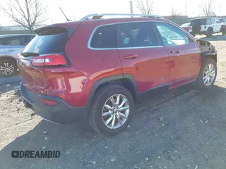 2014 Jeep Cherokee Limited with VIN 1C4PJMDB7EW219458, listed as a IAAI auction lot 41007909 with Not Provided miles and . Bid and sale history available at DreamBid. Image 4.