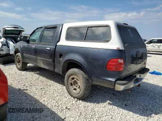 2001 Ford F-150 XLT with VIN 1FTRW08W41KF57904, listed as a Copart auction lot 47250035 with 185,985 mi miles and Clean title. Bid and sale history available at DreamBid. Image 2.