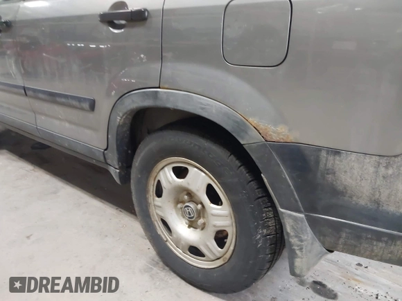 2006 Honda CR-V LX with VIN JHLRD785X6C053853, listed as a IAAI auction lot 42018895 with 246,316 mi miles and . Bid and sale history available at carsss.com. Image 14.