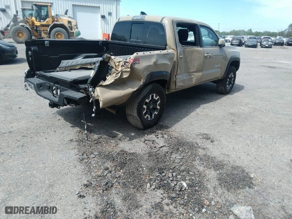 2020 Toyota Tacoma 4WD SR5 with VIN 3TMCZ5AN2LM356140, listed as a IAAI auction lot 41751425 with 80,671 mi miles. Bid and sale history available at carsss.com. Image 4.