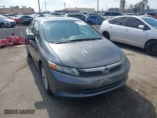 2012 Honda Civic Sdn EX-L with VIN 2HGFB2F94CH515770, listed as a IAAI auction lot 41499824 with 263,591 mi miles. Bid and sale history available at carsss.com. Image 1.