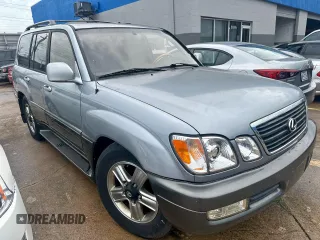 2001 Lexus LX 470 z VIN JTJHT00W313508801, wystawiony jako Copart lot #60938545 z przebiegiem 118 013 mil mil oraz Czysty tytuł • Clean title. Historia ofert i sprzedaży dostępna na DreamBid. Obrazek 1.
