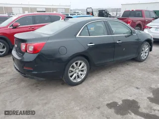 2013 Chevrolet Malibu LTZ with VIN 1G11H5SA1DF123107, listed as a IAAI auction lot 41470772 with 202,752 mi miles. Bid and sale history available at carsss.com. Image 4.