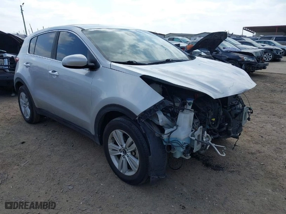 2018 Kia Sportage LX with VIN KNDPM3AC8J7313982, listed as a IAAI auction lot 41514149 with 135,711 mi miles. Bid and sale history available at carsss.com. Image 1.