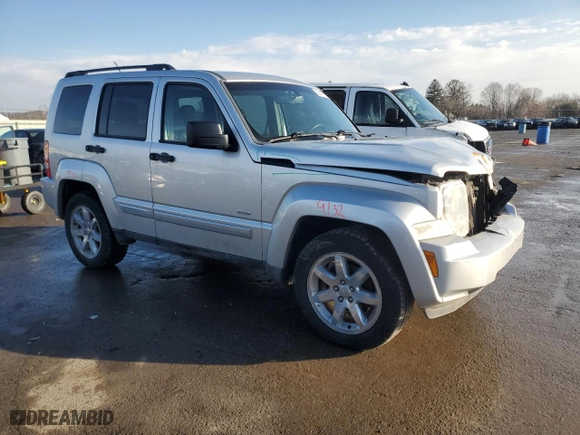 2012 Jeep Liberty Sport Latitude with VIN 1C4PJMAKXCW191723, listed as a Copart auction lot 43417855 with 164,523 mi miles and Salvage Title. Bid and sale history available at carsss.com. Image 4.