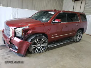 2017 GMC Yukon Denali with VIN 1GKS1CKJ8HR218700, listed as a Copart auction lot 88451155 with 112,348 mi miles and Salvage Title. Bid and sale history available at carsss.com. Image 1.