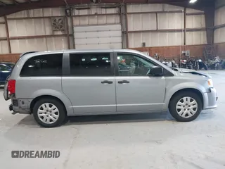 2019 Dodge Grand Caravan SE with VIN 2C4RDGBG3KR571537, listed as a IAAI auction lot 42036875 with 95,190 mi miles and . Bid and sale history available at DreamBid. Image 14.