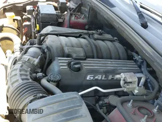 2012 Jeep Grand Cherokee SRT-8 z VIN 1C4RJFDJ9CC120960, wystawiony jako IAAI lot #42713331 z przebiegiem 136 836 mil mil oraz . Historia ofert i sprzedaży dostępna na DreamBid. Obrazek 19.