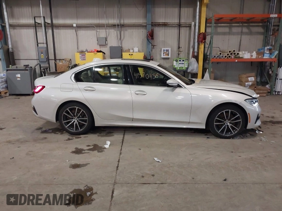 2021 BMW 3 Series 330i xDrive with VIN 3MW5R7J01M8C07735, listed as a IAAI auction lot 41570956 with 70,915 mi miles and . Bid and sale history available at carsss.com. Image 14.