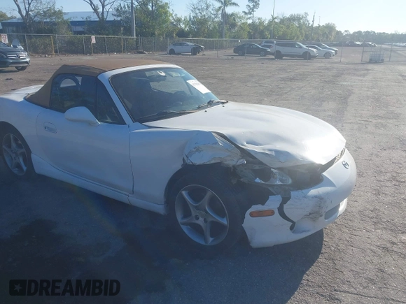 2003 Mazda MX-5 Miata Cloth z VIN JM1NB353730312566, wystawiony jako IAAI lot #41782864 z przebiegiem Nie podano mil oraz . Historia ofert i sprzedaży dostępna na DreamBid. Obrazek 1.
